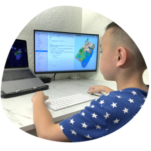 Child at a computer | A balanced approach to technology | Oak Meadow 